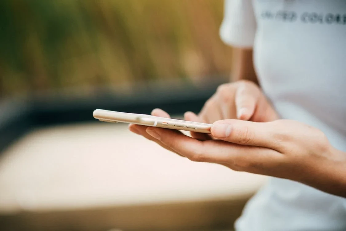 Using puzzle-solving tools Person standing while using phone